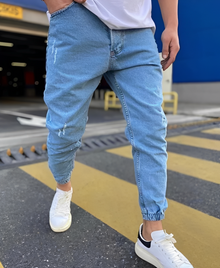 Andre - Modische Herren-Slim-Fit-Jeans mit Rissen in Blau