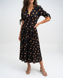 Fabienne - Elegantes Midi Kleid Mit Polka Dot Muster in Schwarz