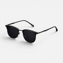 Sonnenbrille Halbrand Metallgestell Getönte Gläser Runde Form in Schwarz