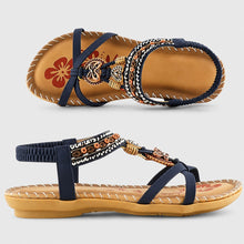 Eleanor - Elegante flache Sandalen mit glitzernden Details in Blau