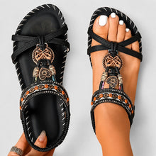 Eleanor - Elegante flache Sandalen mit glitzernden Details in Schwarz