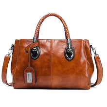 Amory | modische Lederhandtasche in Braun