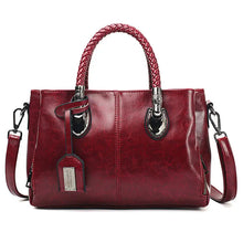 Amory | modische Lederhandtasche in Wein