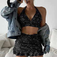 Damen Bikini-Top mit verspieltem Rock-Schnitt und modischem Floral-Design Drune in Schwarz