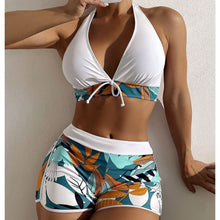 Damen Bikini-Set mit verspieltem Halter-Oberteil und sportlicher Shorts Drune in Weiß