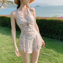 Mira | Dein figurformender Badeanzug im Kleid-Look in Aprikosenblüte