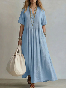 Betsaida – Elegantes Kleid Mit V-Ausschnitt Und kurzen Ärmeln in Blau