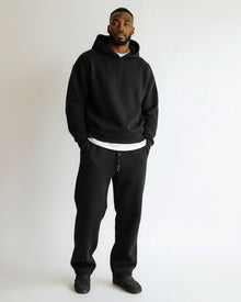 Oversized Loungewear Set für Herren mit Kapuzen Sweatshirt und Jogginghose in Schwarz