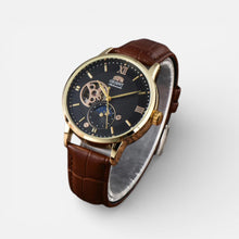 Herren Armbanduhr mit Lederarmband und klassischem Zifferblatt in Braun