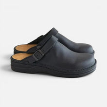 Clogs Slip On mit Schnalle und Profilsohle in Schwarz