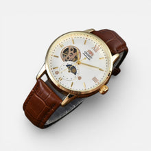 Herren Armbanduhr mit Lederarmband und klassischem Zifferblatt in Gold