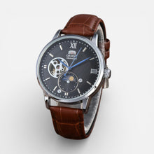 Herren Armbanduhr mit Lederarmband und klassischem Zifferblatt in Silber