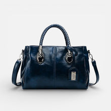 Damen Handtasche mit geflochtenen Griffen und mehreren Fächern in Blau